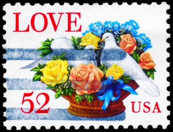 Royalty Free Photo of 1994 US Stamp Shows the Pigeons in Flower Basket
