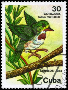 CUBA - CIRCA 1984: A Stamp printed in CUBA shows image of a Cuban Tody with the description Todus multicolor from the series Fauna, circa 1984