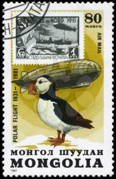 MONGOLIA - CIRCA 1981: A Stamp printed in MONGOLIA shows the image of the Graf Zeppelin & Puffin from the series Polar Flight 1931-1981, circa 1981