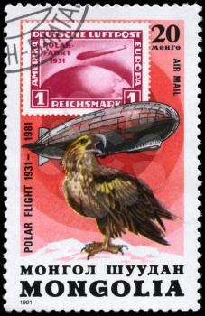 MONGOLIA - CIRCA 1981: A Stamp printed in MONGOLIA shows the image of the Graf Zeppelin & Sea Eagle from the series Polar Flight 1931-1981, circa 1981