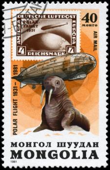 MONGOLIA - CIRCA 1981: A Stamp printed in MONGOLIA shows the image of the Graf Zeppelin & Walrus from the series Polar Flight 1931-1981, circa 1981