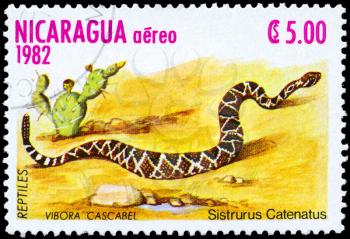 NICARAGUA - CIRCA 1982: A Stamp printed in NICARAGUA shows the image of a Massasauga with the description Sistrurus catenatus from the series Reptiles, circa 1982