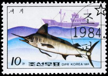 NORTH KOREA - CIRCA 1984: A Stamp printed in NORTH KOREA shows image of a Marlin and Trawler from the series Fishing Industry, circa 1984