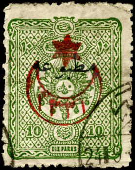 TURKEY - CIRCA 1890: A Stamp printed in TURKEY shows the Arms and Tughra of El Gazi(The Conqueror) Sultan Abdul Hamid, series, circa 1890