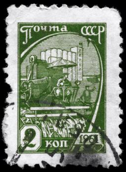USSR - CIRCA 1961: A Stamp printed in USSR shows the Harvester and Silo, series, circa 1961