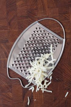 Royalty Free Photo of a Grater and Horseradish