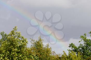 Royalty Free Photo of a Rainbow in the Sky