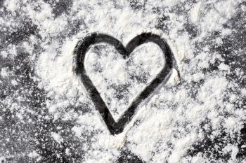 Royalty Free Photo of a Heart in Flour