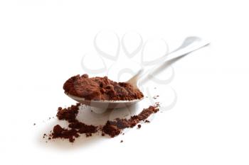 Royalty Free Photo of a Spoonful of Cocoa Powder