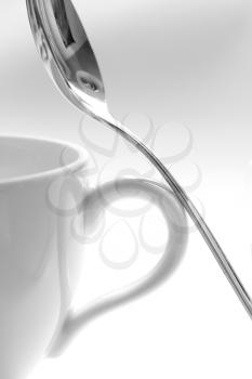 Royalty Free Photo of a Teacup and Spoon