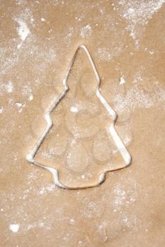 Royalty Free Photo of a Cookie Cutter on Dough