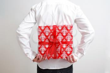 Royalty Free Photo of a Man Holding a Present