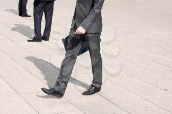 Royalty Free Photo of a Businessman Walking