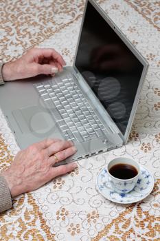 Royalty Free Photo of a Person Using a Laptop