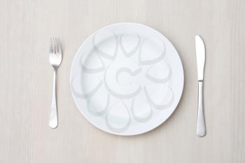 Royalty Free Photo of a Plate and Utensils