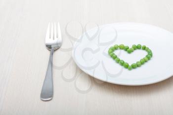 Royalty Free Photo of Heart Shape Peas on a Plate