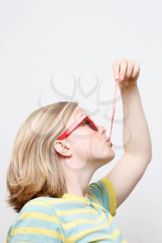 Royalty Free Photo of a Girl Playing With Bubblegum