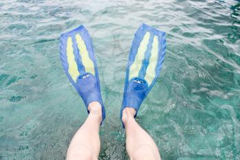 Royalty Free Photo of a Person Wearing Flippers
