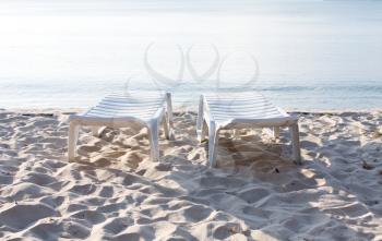Royalty Free Photo of Chairs on a Beach