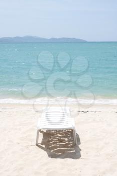 Royalty Free Photo of a Chair on the Beach