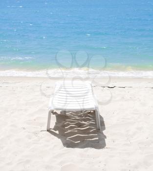 Royalty Free Photo of a Chair at the Beach