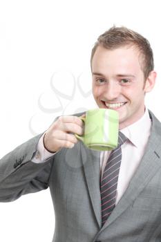 Royalty Free Photo of a Businessman Drinking Coffee