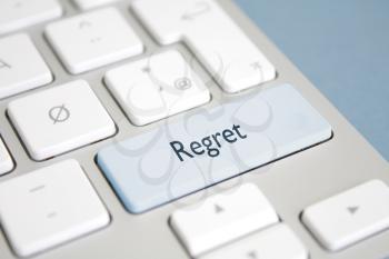 Royalty Free Photo of a Regret Button on a Keyboard