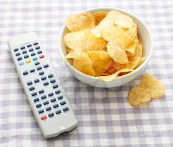 Royalty Free Photo of Chips and a Remote Control