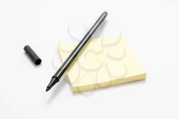 Royalty Free Photo of a Pen on a Notepad