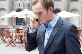 Royalty Free Photo of a Businessman on a Cellphone