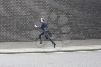 Royalty Free Photo of a Businessman Running