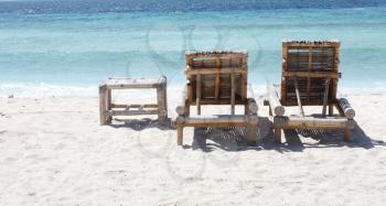 Royalty Free Photo of Chairs on the Beach