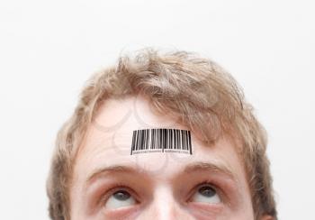 Royalty Free Photo of a Barcode on a Man's Forehead
