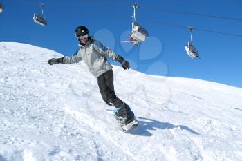 Royalty Free Photo of a Snowboarder