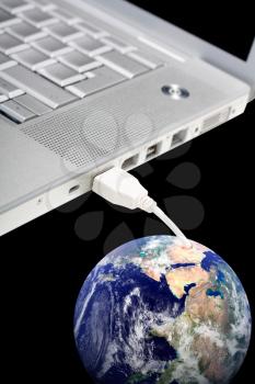 Royalty Free Photo of a Laptop With an Earth