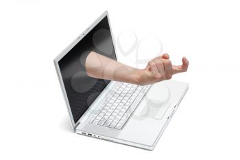 Royalty Free Photo of a Hand in a Laptop
