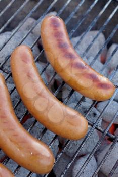 Royalty Free Photo of Sausages on a Barbecue