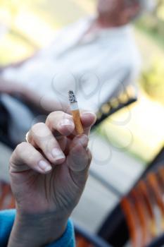 Royalty Free Photo of a Senior Woman Smoking