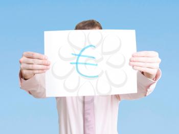 Royalty Free Photo of a Person Holding a Euro Sign