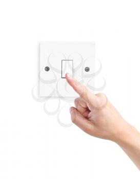 Royalty Free Photo of a Person Using a Light Switch