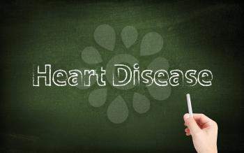 Heart disease written on a blackboard