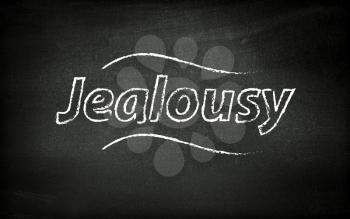 Jealousy written on blackboard