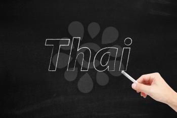 The language of Thai written on a blackboard