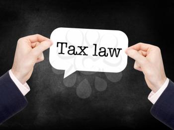 Tax law written on a speechbubble