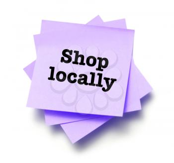 Shop locally written on a note