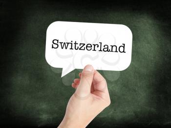 Switzerland written on a speechbubble