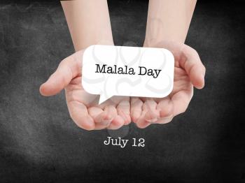 Malala Day written on a speechbubble
