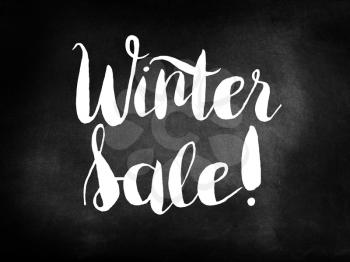 Winter sale on blackboard
