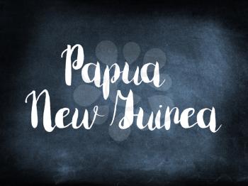 Papua New Guinea written on a blackboard