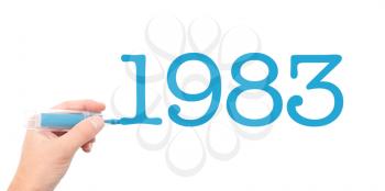 The year of 1983written with a marker